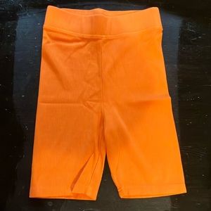 NEW in bag Talentless women’s biker shorts in safety orange size: XS